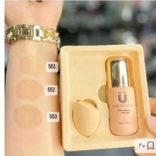 کرم پودر لاکچری کوین مدل Liquid Foundation High Cover همراه پد آرایشی